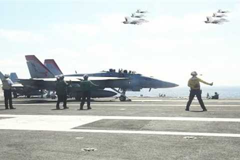 The powerful F/A-18 Super Hornet multipurpose fighter jet in action over a US aircraft carrier